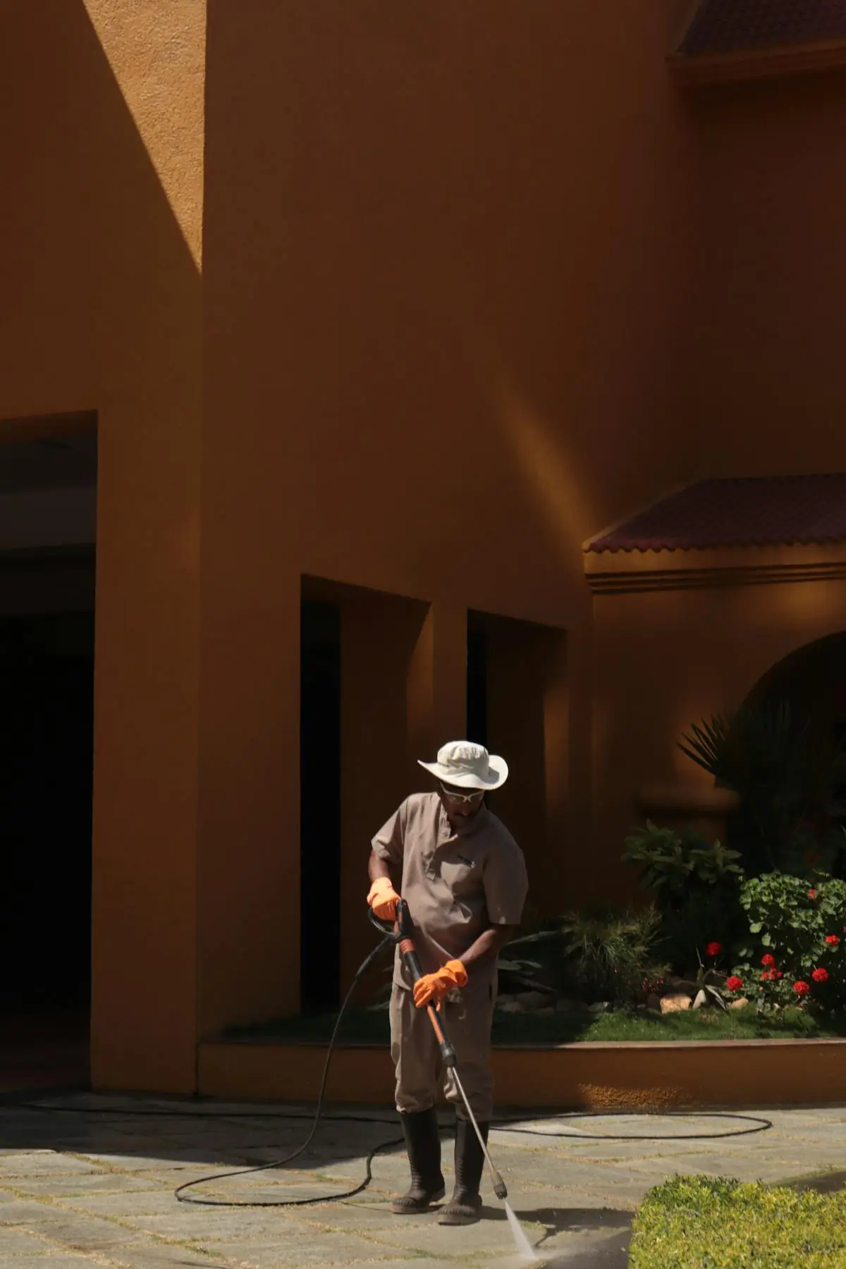 Pressure washing a paver patio